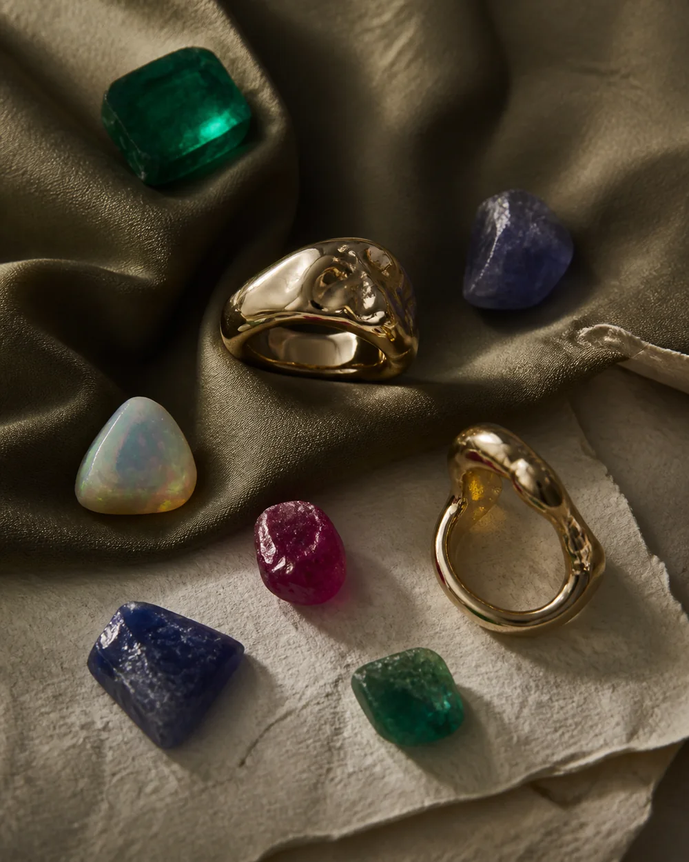 Irregular gemstones and sculptural gold rings